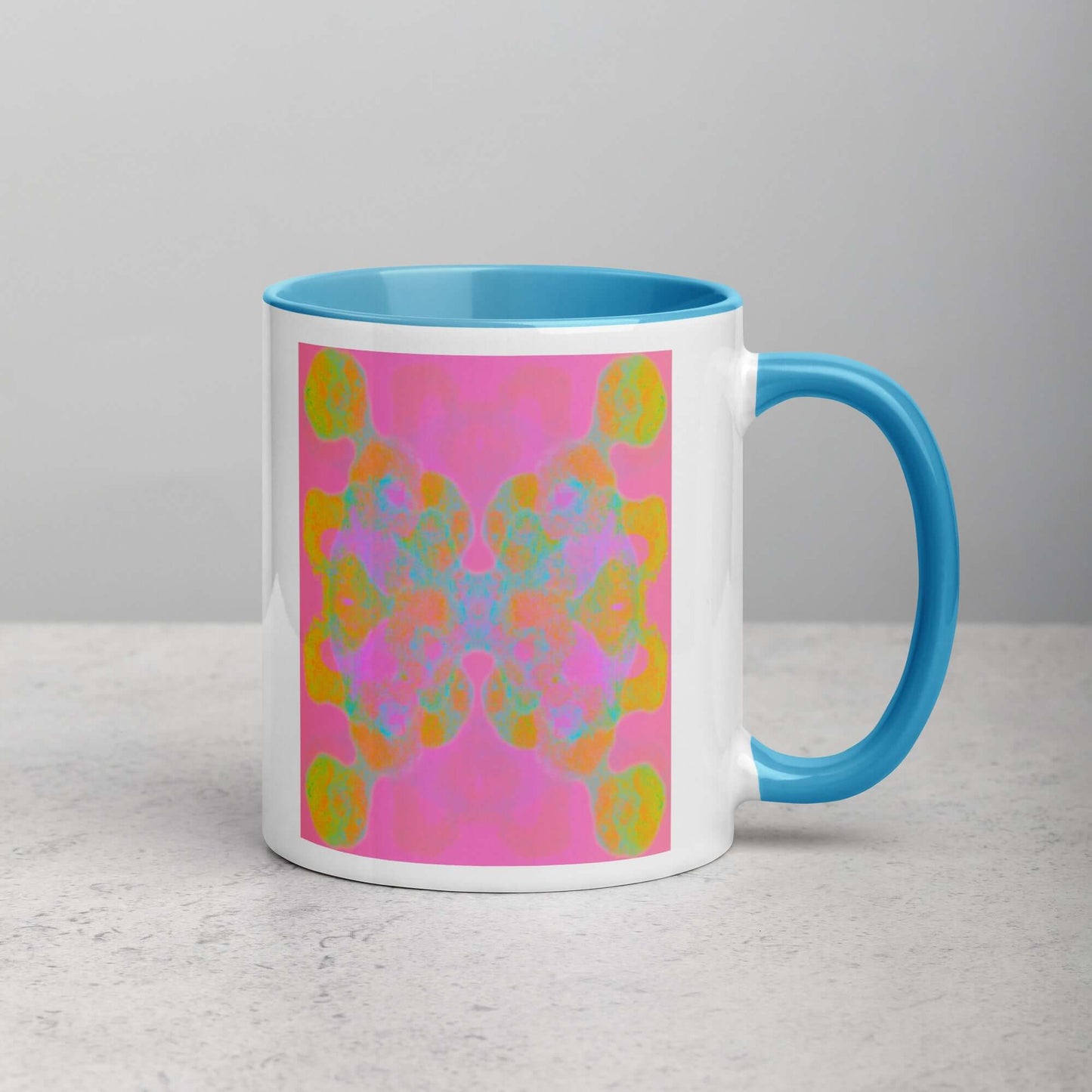 Colorful Abstract Butterfly Shape on Pink Background “Double the Fun” Abstract Art Mug with Light Blue Color Inside Right Handed Front View