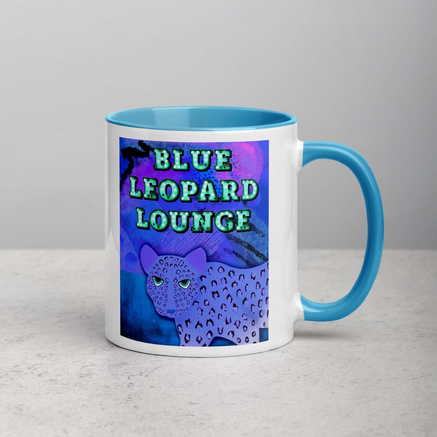Purple Leopard on Blue and Purple Abstract Background with Text “Blue Leopard Lounge” Mug with Light Blue Color Inside Right Handed Front View