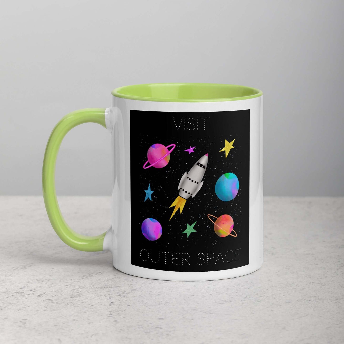 Whimsical Space Rocket with Colorful Planets and Stars on Black Background with Text “Visit Outer Space” Mug with Lime Green Color Inside Left Handed Front View