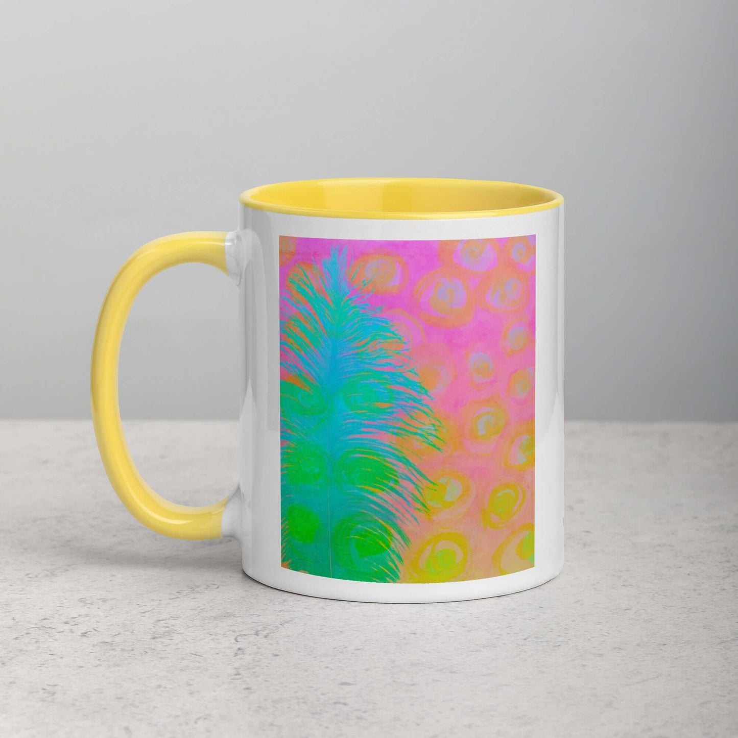 Bright Blue-Green Ostrich Feather on Pink and Yellow Background “My Other Half” Abstract Art Mug with Bright Yellow Color Inside Left Handed Front View